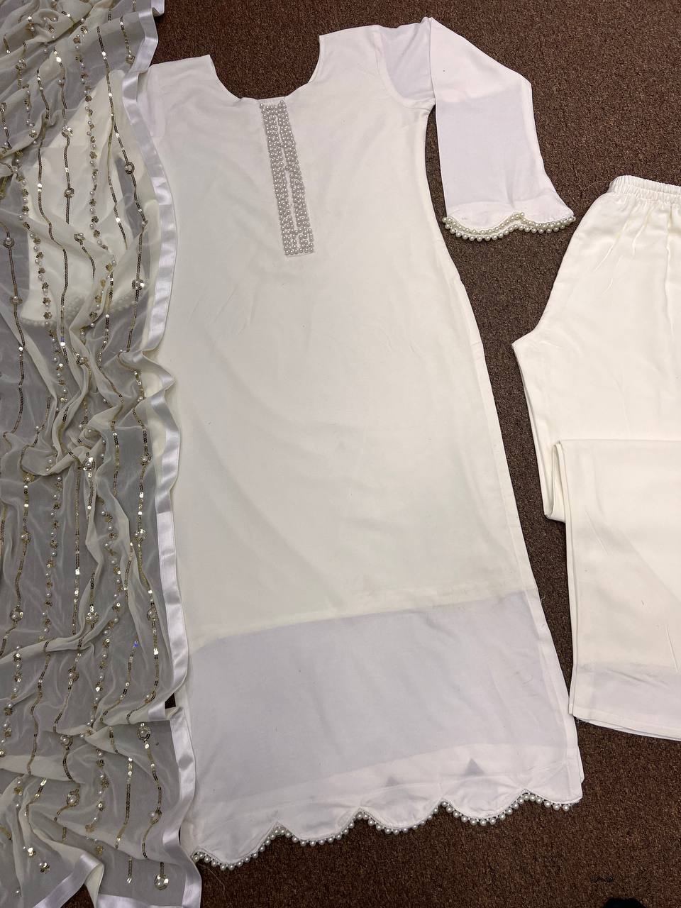 Beautiful Suit Set With Fancy Stitching Riveted Moti Work