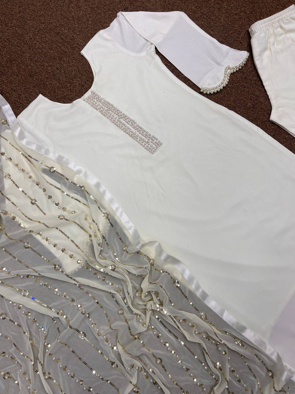 Beautiful Suit Set With Fancy Stitching Riveted Moti Work