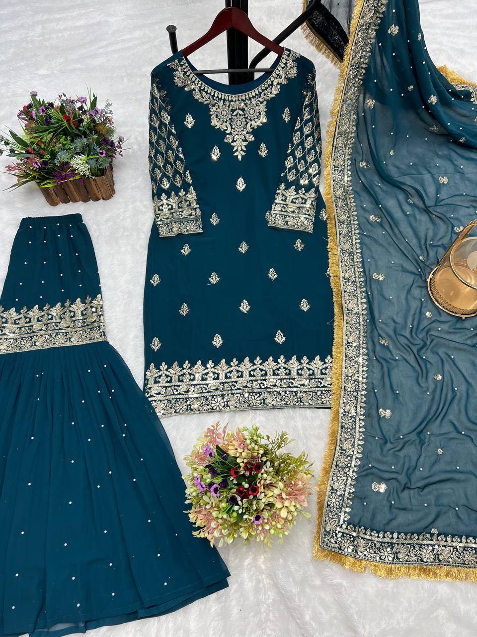 पार्टी वियर खूबसूरत टॉप शरारा और दुपट्टा सीक्वेंस वर्क के साथ