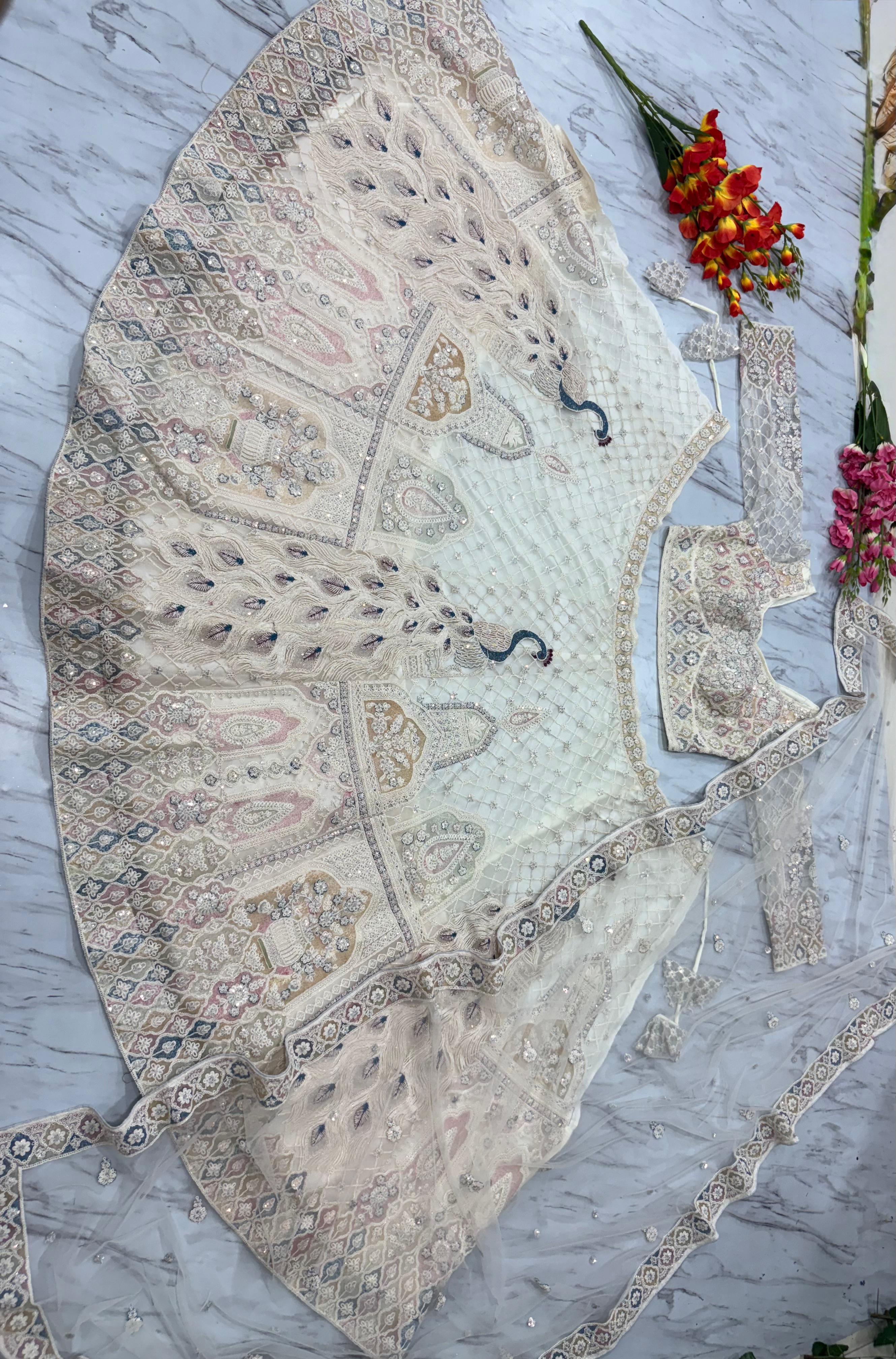 Designer Lehenga Choli With Beautiful Multi Thread Embroidery