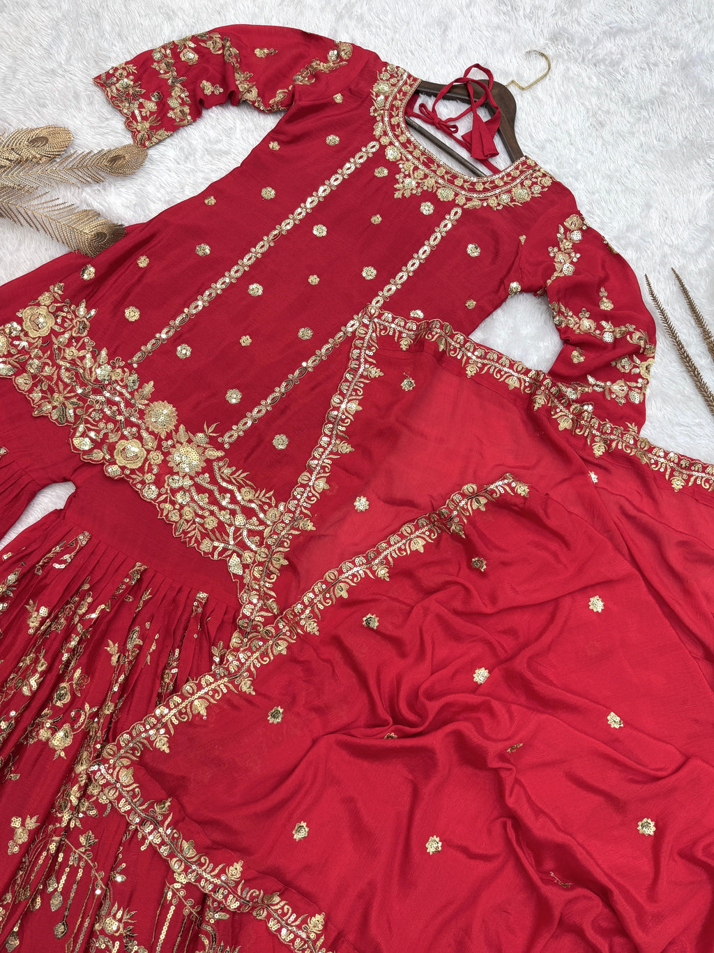 कढ़ाई और सीक्वेंस वर्क वाला फैंसी टॉप-शरारा और दुपट्टा