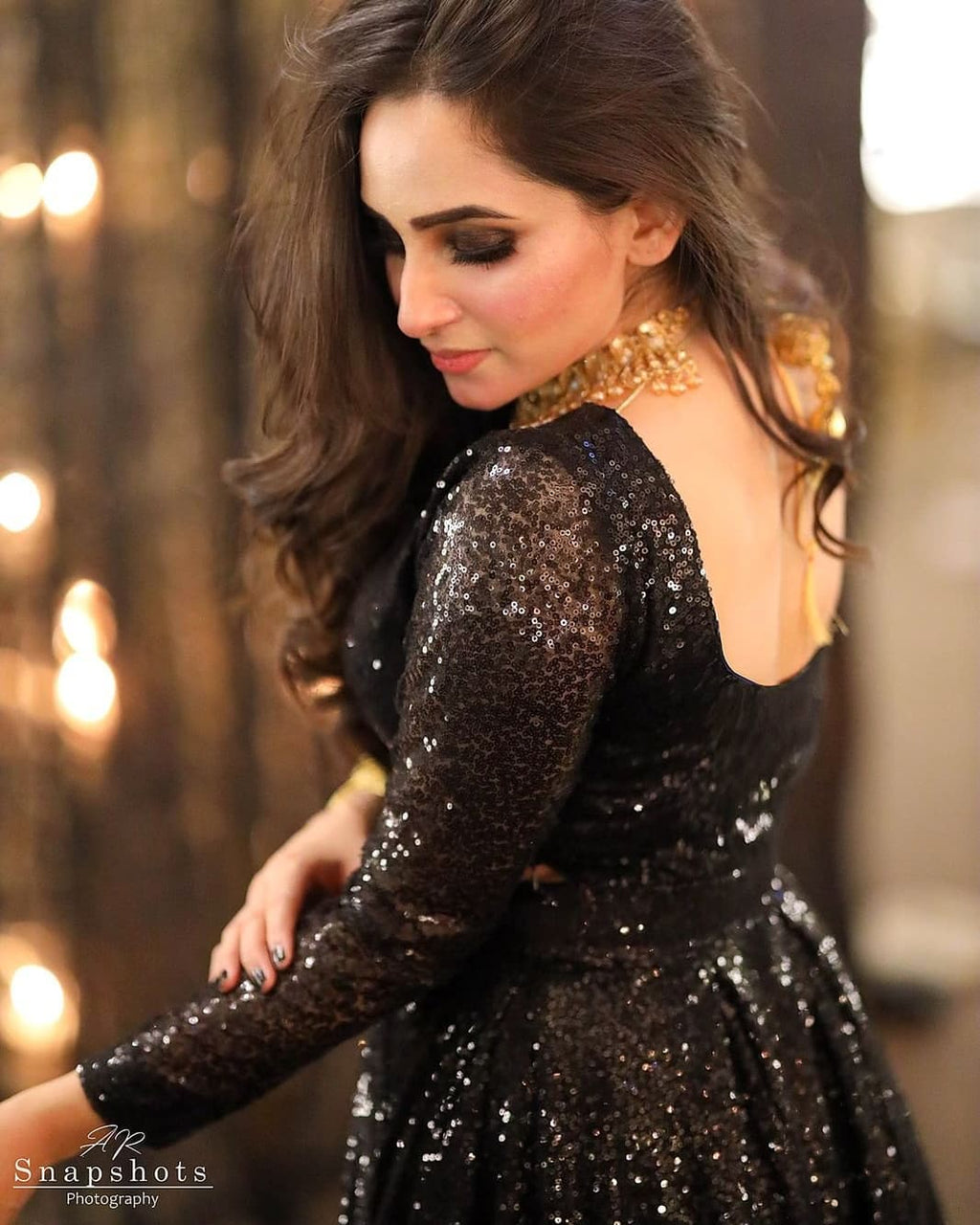 पार्टी वियर डिज़ाइनर लहंगा चोली हैवी सीक्वेंस वर्क के साथ