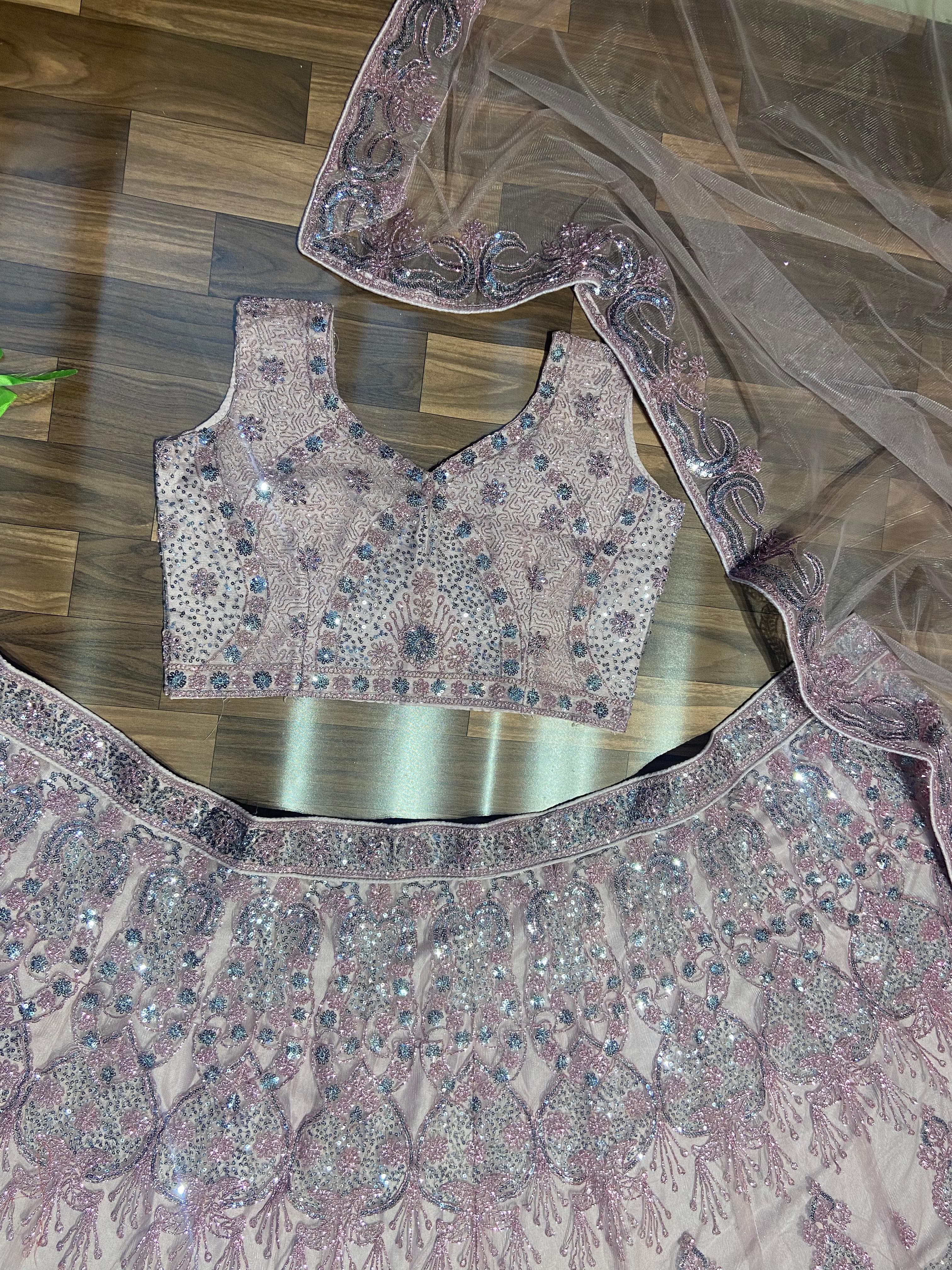 Party Wear Lehenga Choli With Beautiful Glitter Dori And Sequence Work