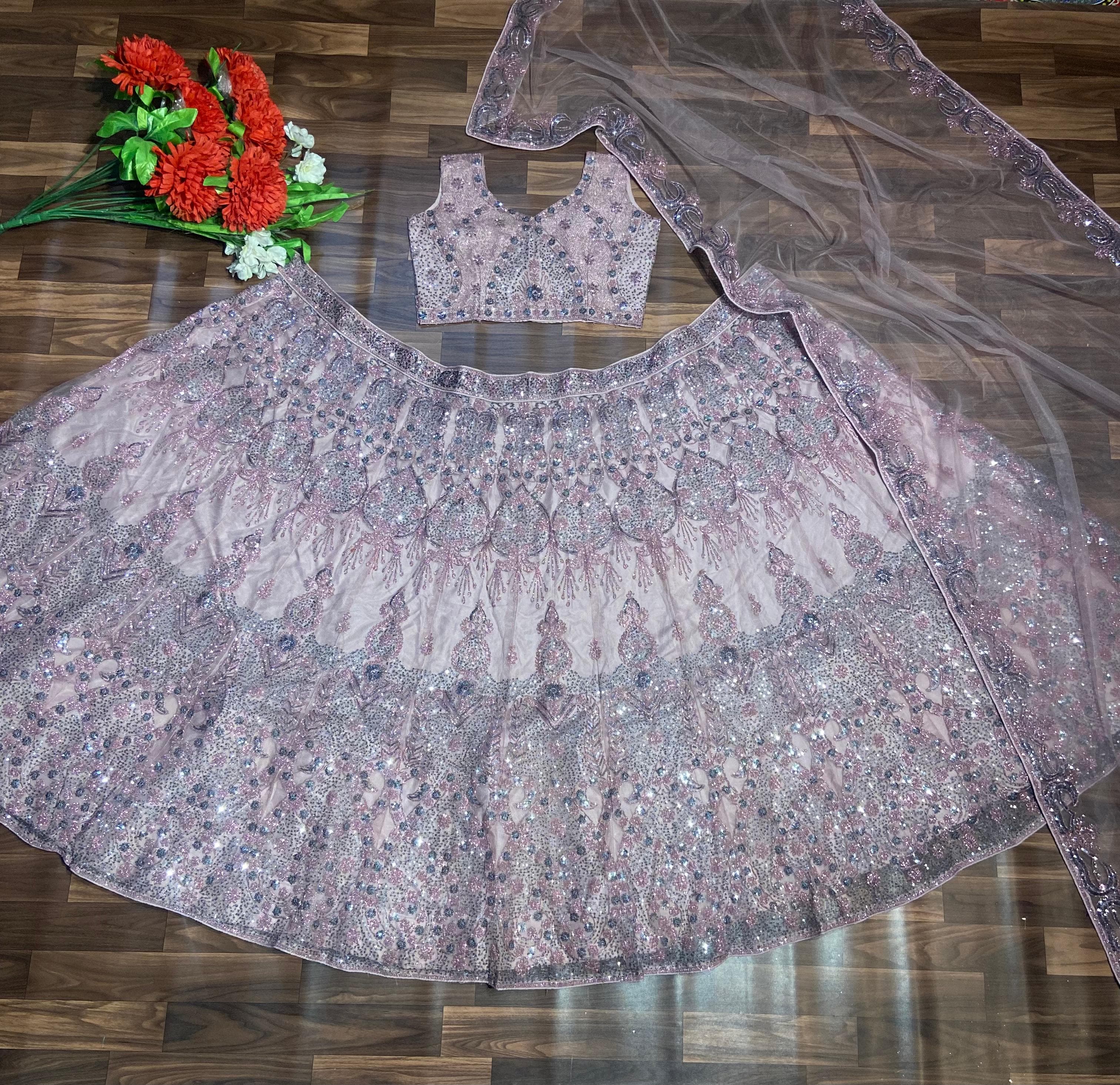 Party Wear Lehenga Choli With Beautiful Glitter Dori And Sequence Work