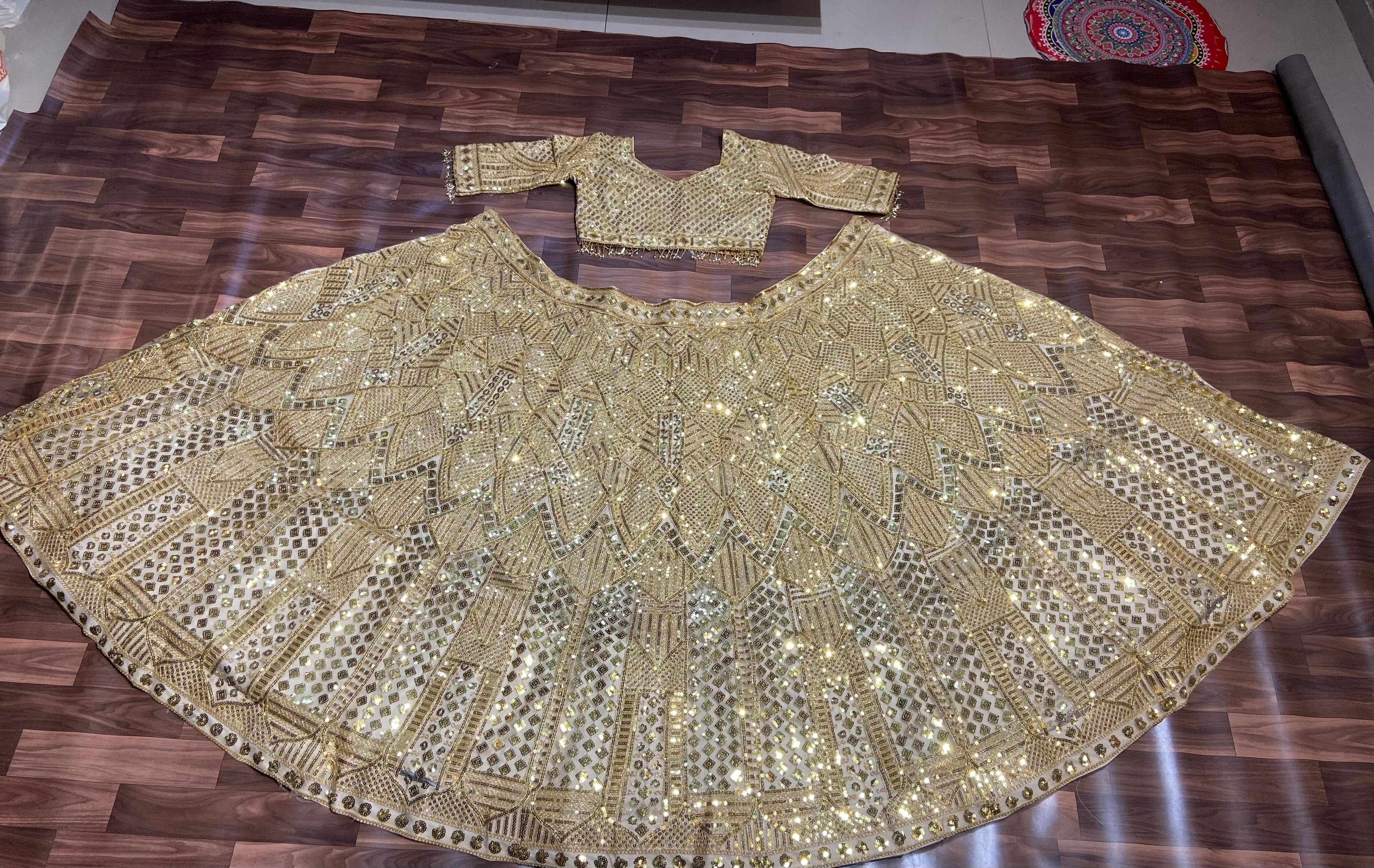 खूबसूरत डोरी वर्क के साथ डिज़ाइनर लहंगा चोली